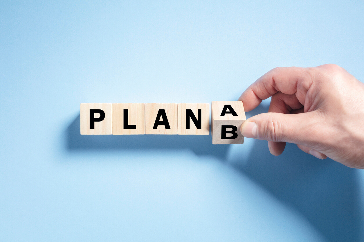 Building blocks arranged to spell Plan B for business disaster preparedness.