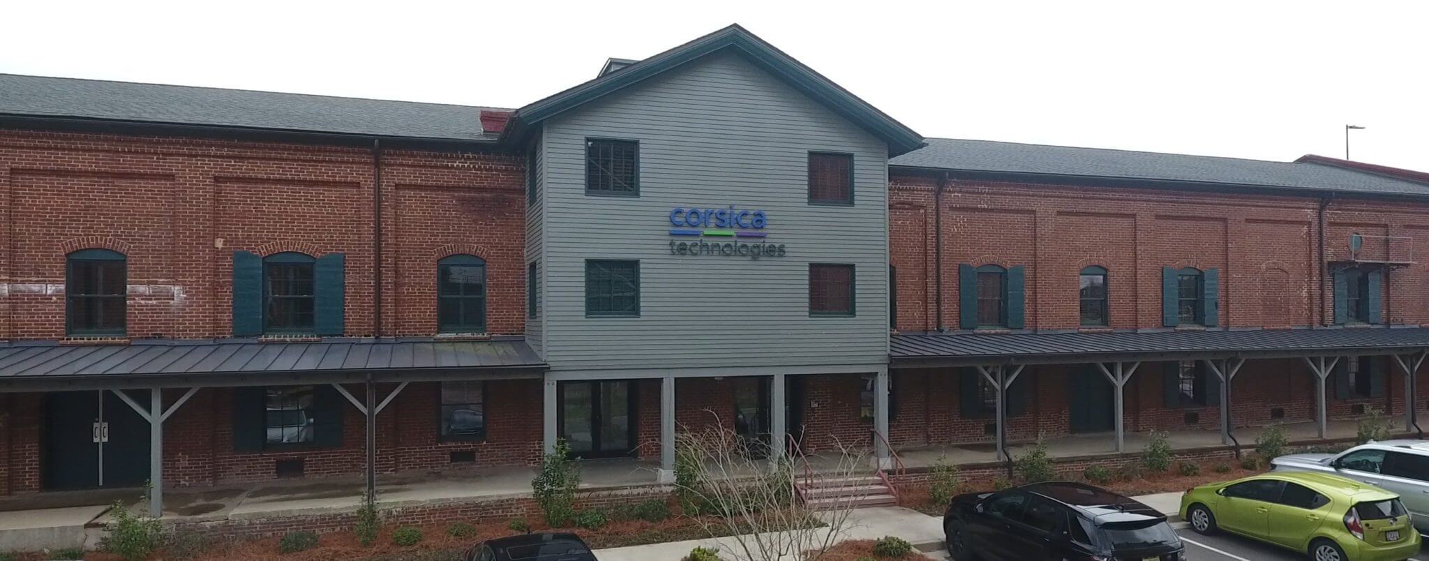 Outside view of the Corscia Technologies brick building.